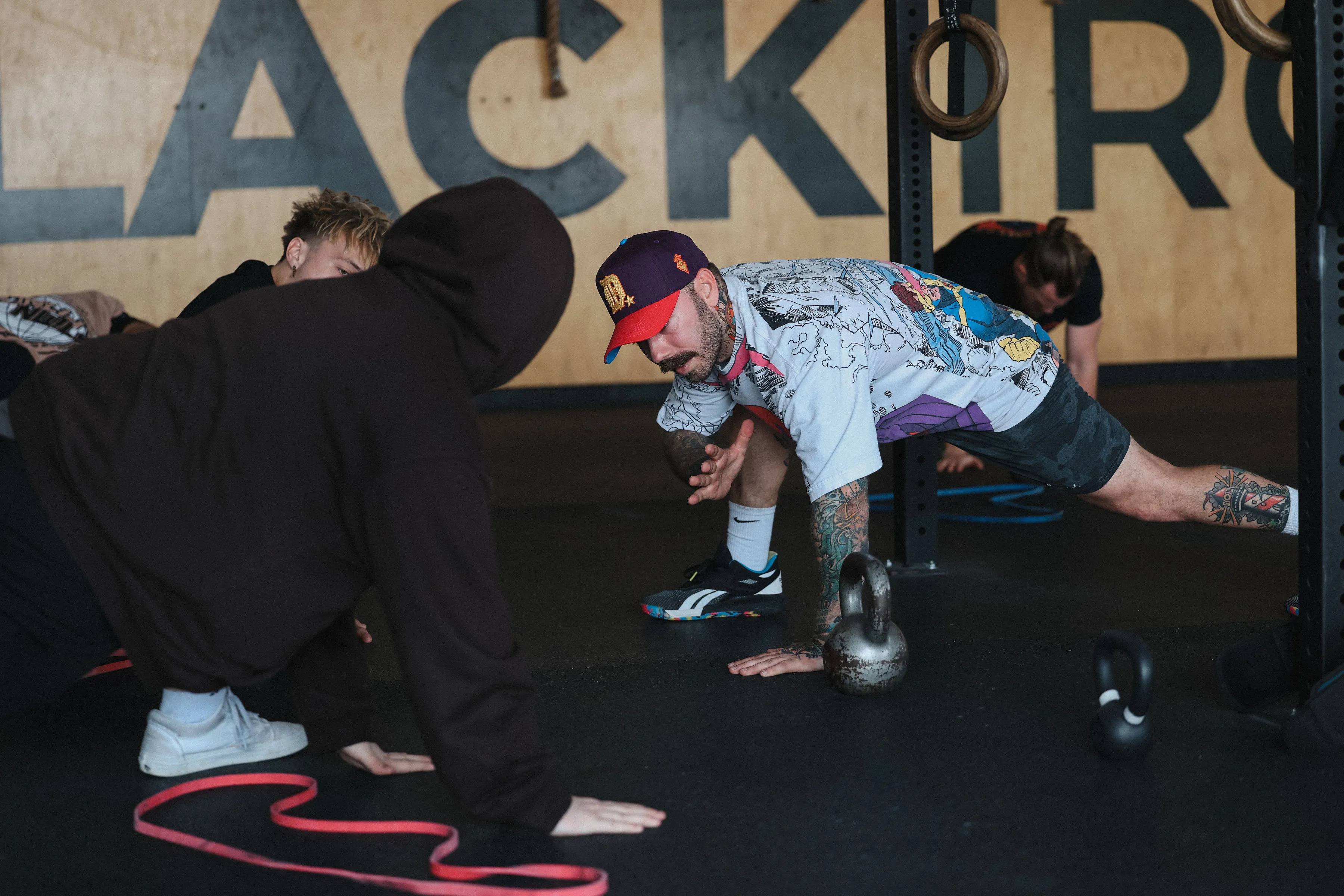 Group class warming up together on the training floor